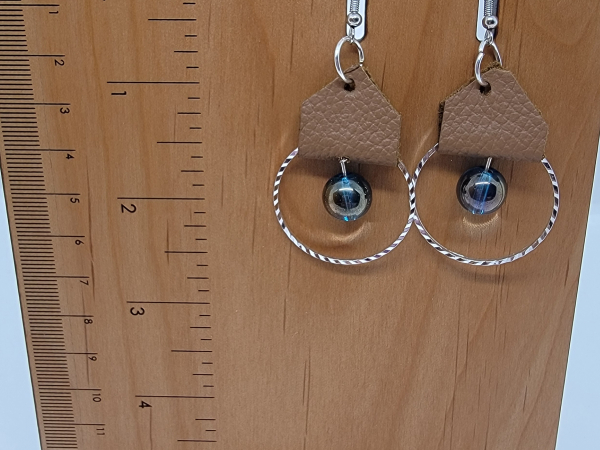 Leather and silver hoop earrings with iridescent beads