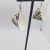 Black/white snakeskin faux leather earrings