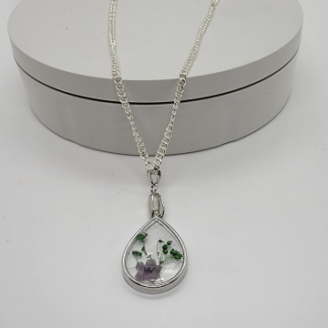 Silver teardrop resin flower pendant